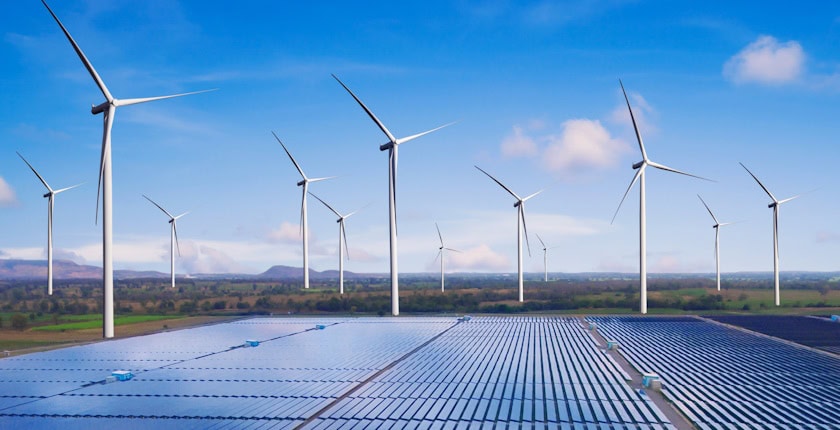 Solar panel and wind turbine farm clean energy.