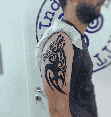 25 Best Tribal Wolf Tattoo Designs With Meaning Tattoo Like The Pros