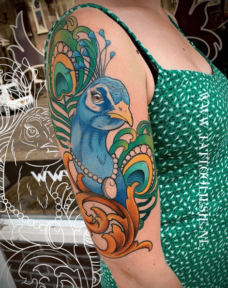 Bicep Peacock Feather Girl Head Tattoo