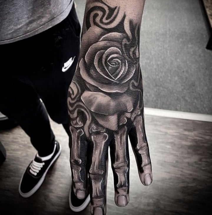 20 Cool  Terrifying Skeleton Hand Tattoo  Tattoo Like The Pros