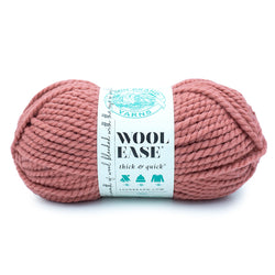 skein of Wool-Ease® Thick & Quick® Yarn on white background