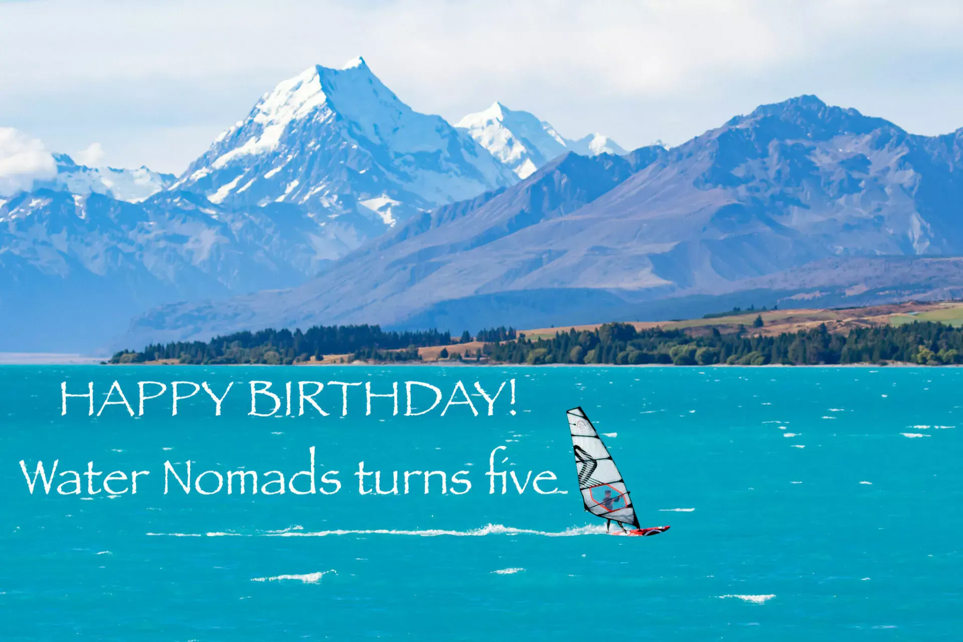 Windsurfer on Lake Pukaki with Mount Cook in the background