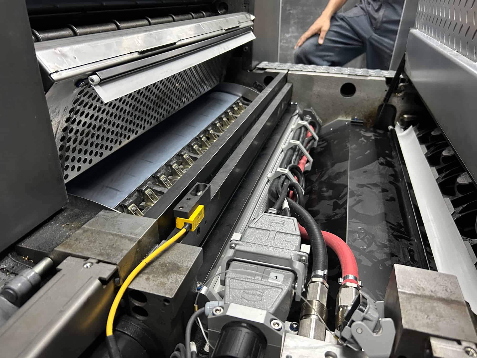 Die Bilder zeigen die Installation von E4C auf einer Heidelberg XL75.