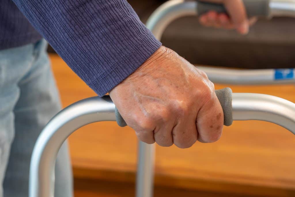 Walking aid grip for seniors during social activities at Four Pointes.