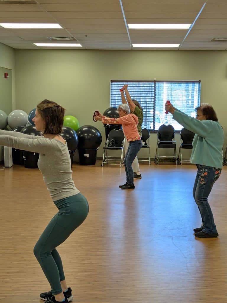 Older adults participating in a fitness class at Four Pointes Center for Successful Aging.