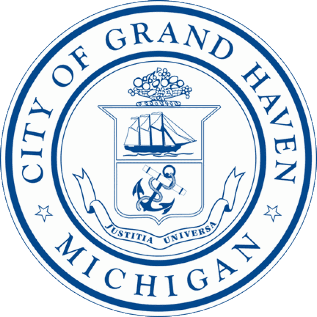 Official seal of the City of Grand Haven Michigan with ship and anchor symbols.