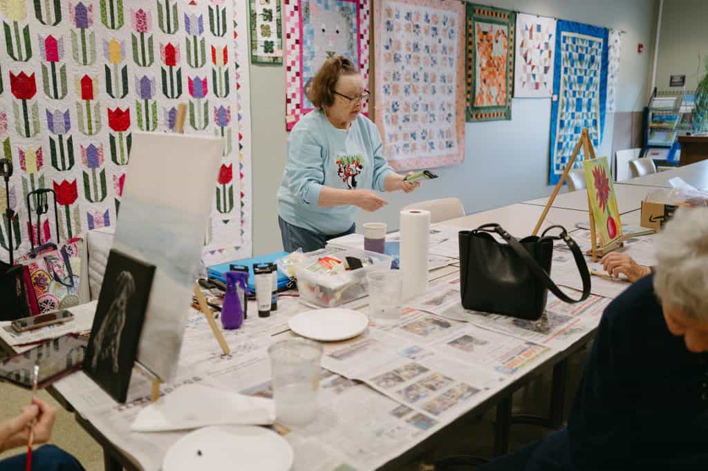 Older adults participating in an art class at Four Pointes Center for Successful Aging.