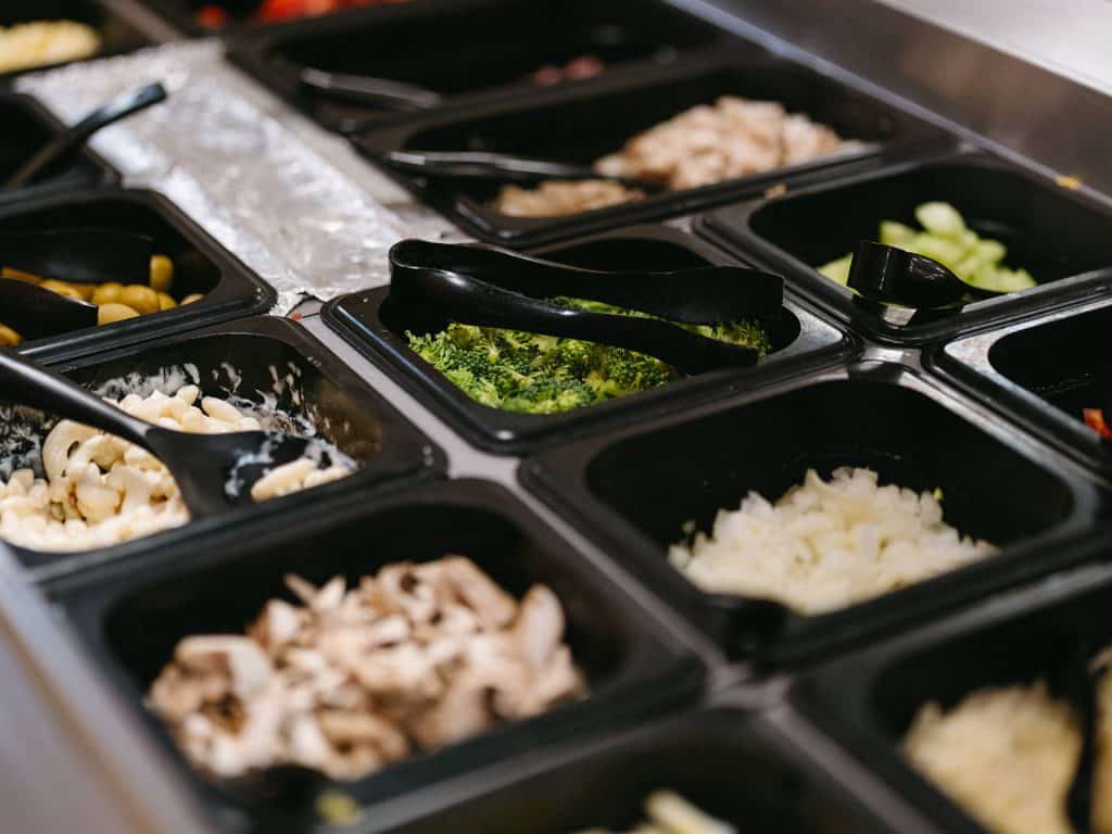 Variety of fresh vegetables and toppings at Four Pointes Center for Successful Aging.