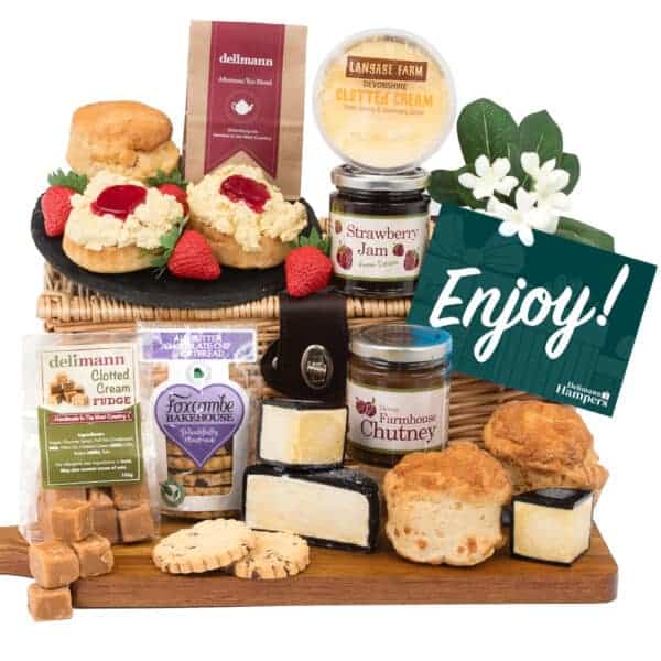 A Gluten Free Afternoon Tea With Cheese & Chutney featuring scones, biscuits, and a tea.