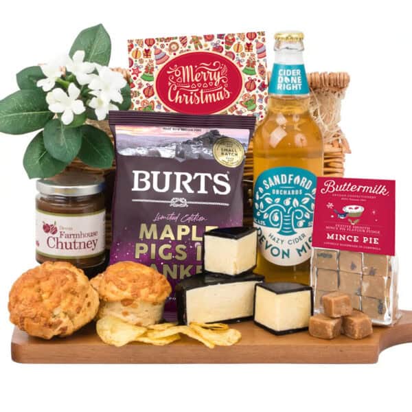 The Gluten Free Festive Ploughman's Tea is an ideal festive gift hamper, complete with cheese, gf cheese scones, cider, chutney, mince pie fudge and pigs in blankets crisps.