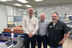 Left to right_Dan Chandler, Pat Tully and Jeff Busse alongside one of the five lines equipped with GEW LeoLED curing.