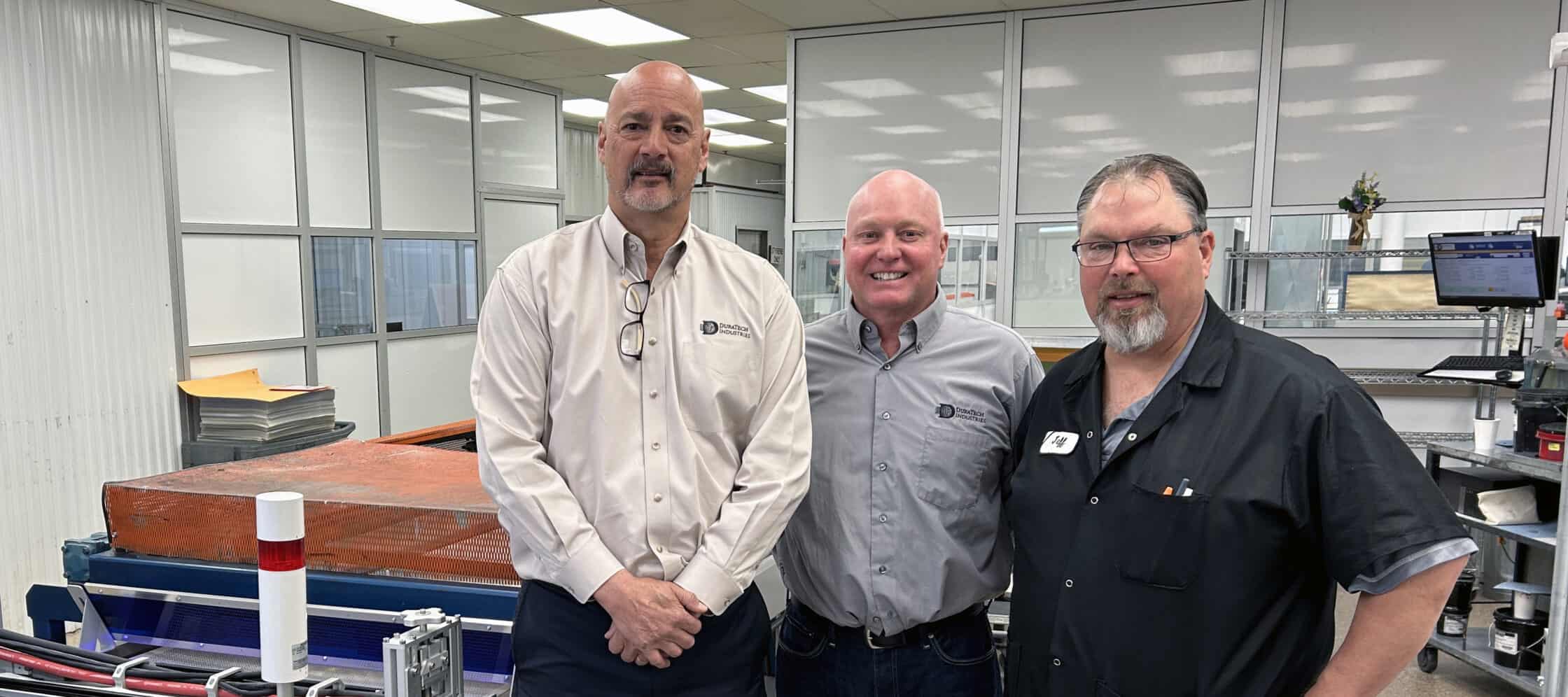 Left to right_Dan Chandler, Pat Tully and Jeff Busse alongside one of the five lines equipped with GEW LeoLED curing.