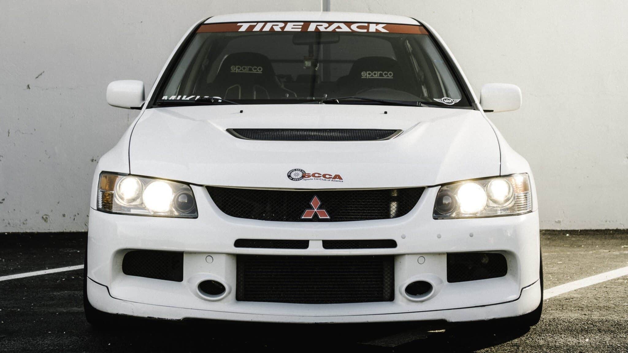 _DSC8193-Edit Cropped-min Tasha Mikko’s race car is a 2006 Mitsubishi Evo 9. She named it “Robbie” in honor of her grandfather.