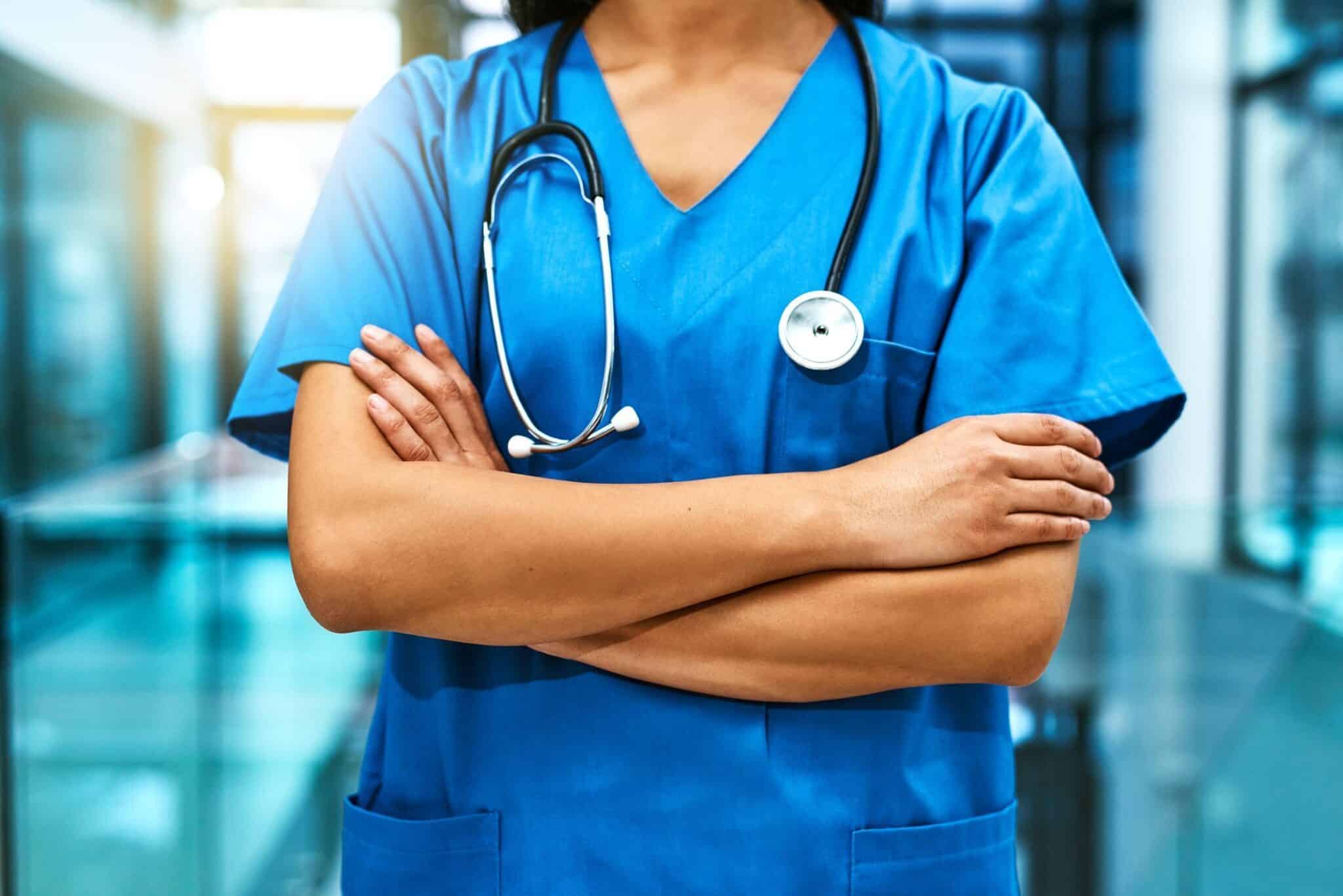 These hands will take care of you Shot of an unrecognisable nurse standing in a hospital
