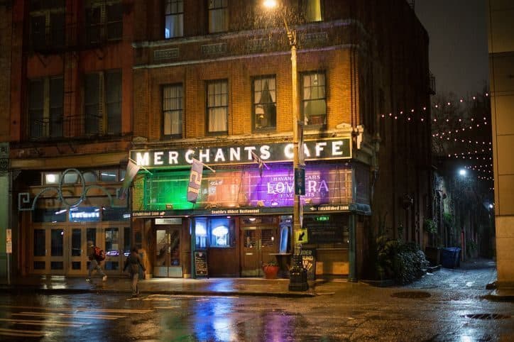 Seattle, United States - February 17, 2016: Rainy night at Merchants Cafe and Saloon, Seattle oldest Restaurant in Historic Pioneer Square.