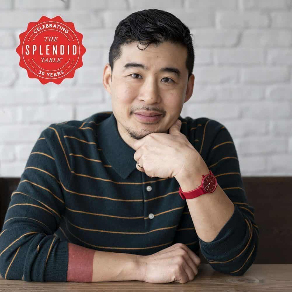 A man wearing a striped sweater and red watch sits at a table, smiling with his hand under his chin. A "The Splendid Table 30 Years" badge and "Must List 04-17-2025" appear in the corner.