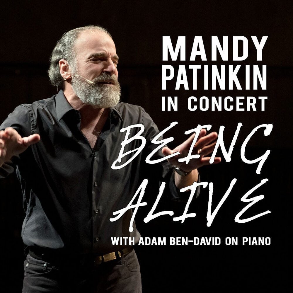 Mandy Patinkin performing on stage with arms outstretched; text reads "Mandy Patinkin In Concert: Being Alive with Adam Ben-David on piano." A Must List event on 04-24-2025.