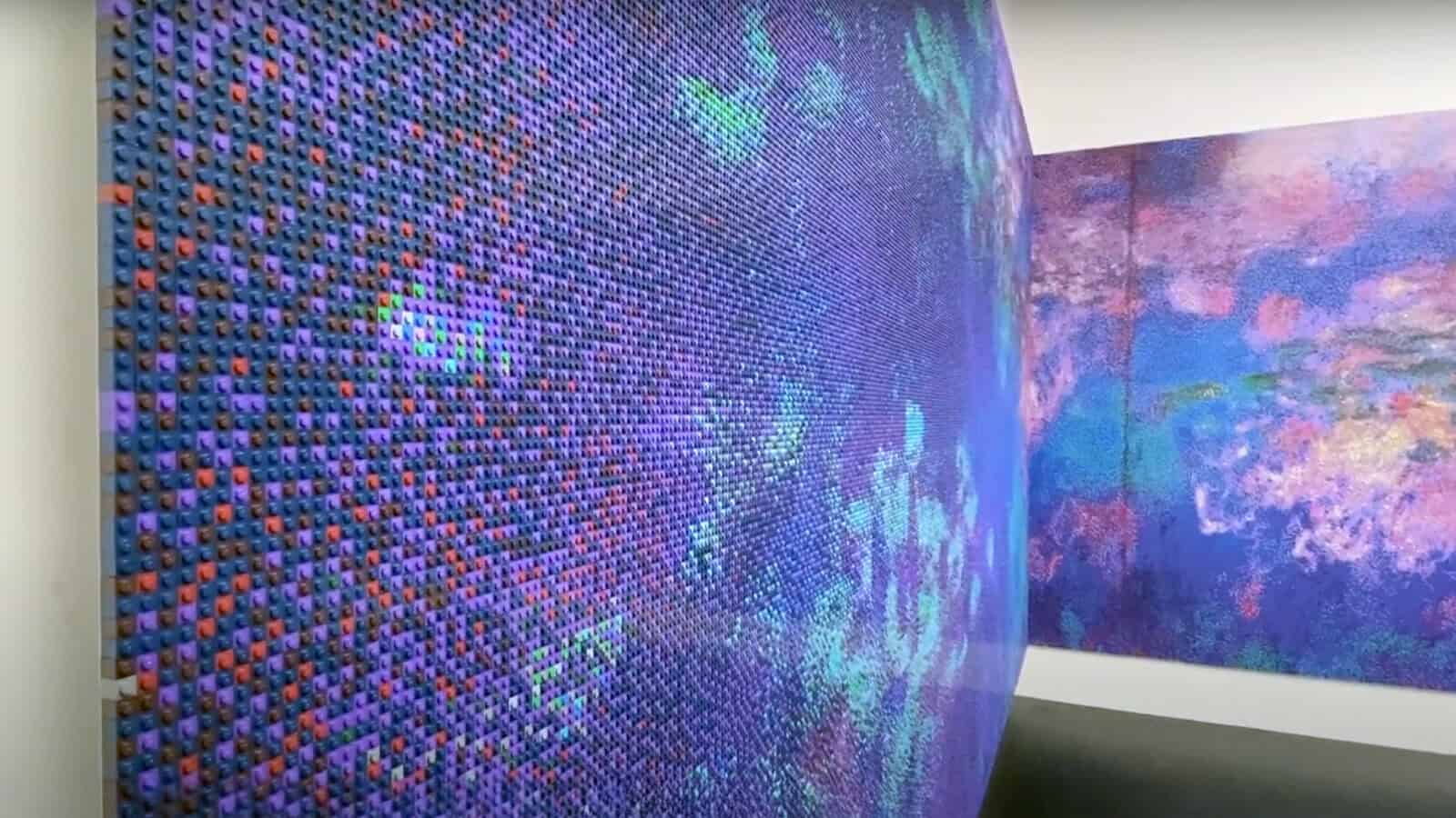 A close-up view of a large, pixelated artwork with a blue, purple, and green color scheme displayed in a modern gallery space during Sound To Summit: AANHPI Voices Rising in Seattle.