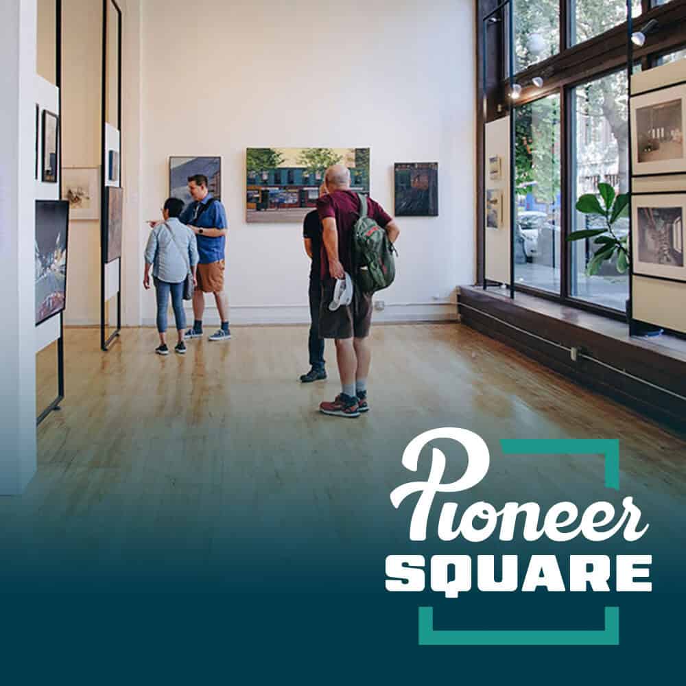 People view artwork in a bright, modern gallery with wooden floors and large windows. "Pioneer Square" and "Must List 05-29-2025" are displayed in bold text at the bottom.