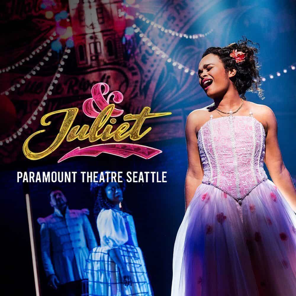 A performer in a pink dress sings on stage under dramatic lighting, as “& Juliet” and “Paramount Theatre Seattle” Must List appear onscreen. Two actors stand in the background. Don’t miss this show on 07-24-2025!.
