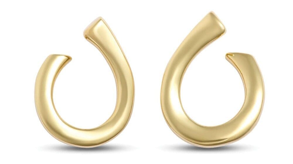 A pair of gold, crescent-shaped hoop earrings with a smooth, polished finish displayed against a white background—perfect for those seeking meaningful gifts or inspiration from any gift guide.