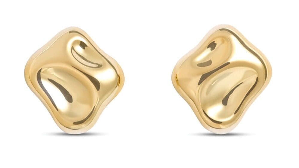 A pair of gold, irregularly shaped stud earrings with a smooth, polished surface, perfect for Gift Guide features or as meaningful gifts, displayed on a white background.