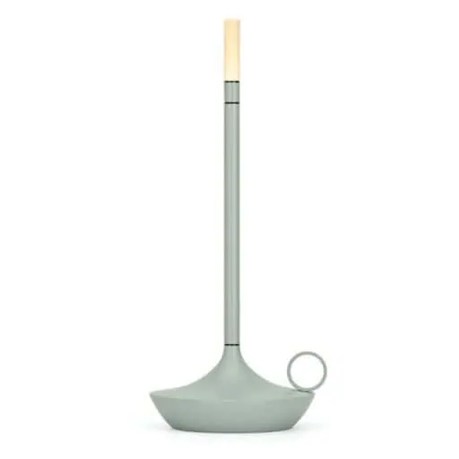 A modern, minimalist candle holder with a tall, thin stem, a circular handle, and a light green base, holding a single beige candle—an elegant choice for gift ideas or any curated gift guide.