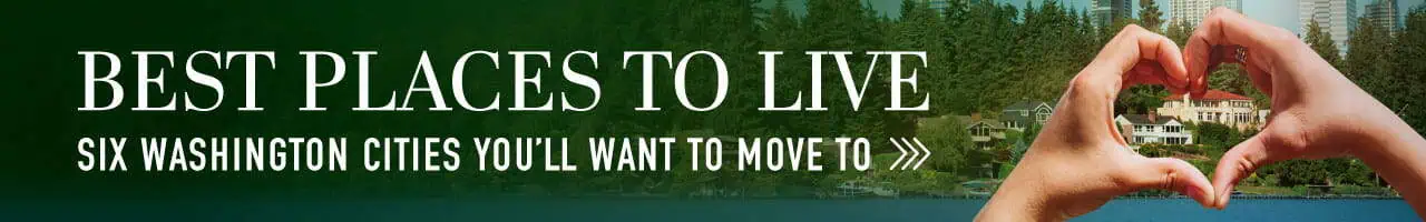 Banner with the text "Best Places to Live: Six Washington Cities You'll Want to Move To"—like Seattle—features hands forming a heart shape over a scenic lakeside neighborhood, evoking the cover of a stylish magazine.