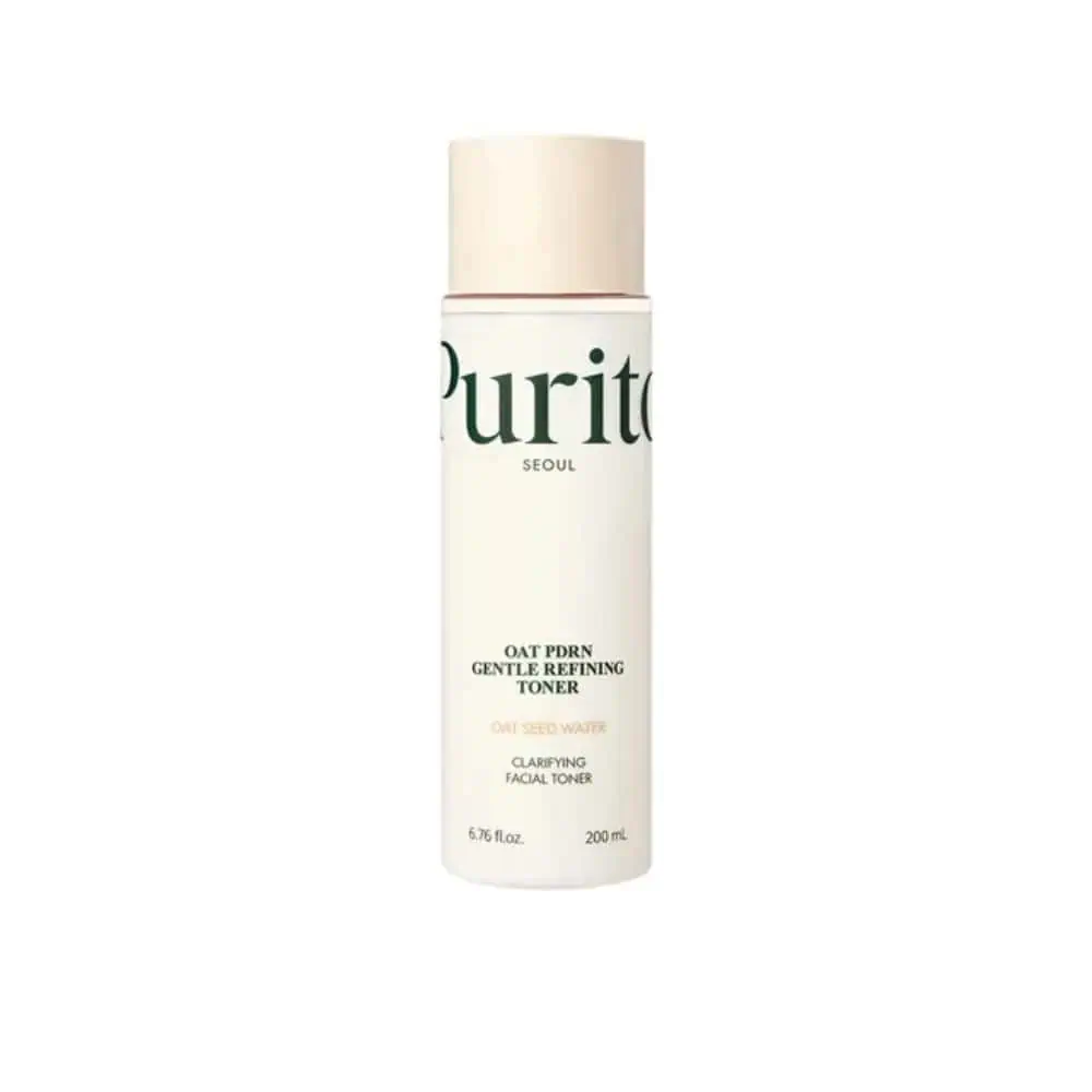 A bottle of Purito Oat In Gentle Refining Toner, 200 ml size, with a beige cap and minimalist label design.