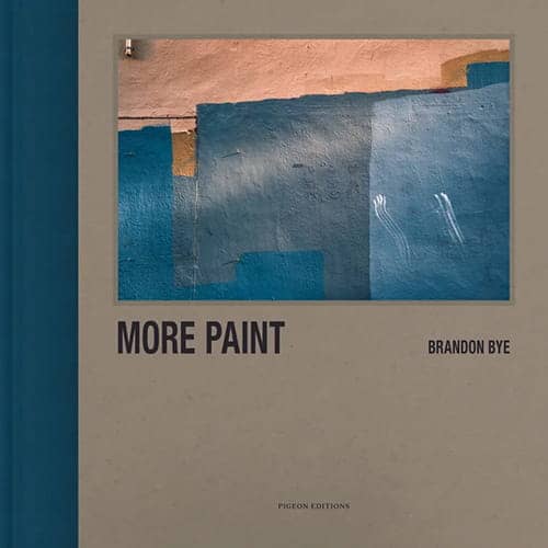 Book cover for "More Paint" by Brandon Bye features a photo of a painted wall in blue shades, with visible brush marks and overlapping paint patches, echoing the layered textures seen in Seattle graffiti.