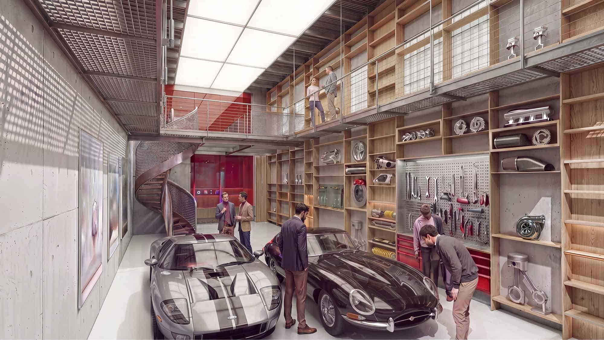 A modern garage with two classic cars and five people inspecting the vehicles, featuring organized shelves with Formula One auto parts and tools along the walls.