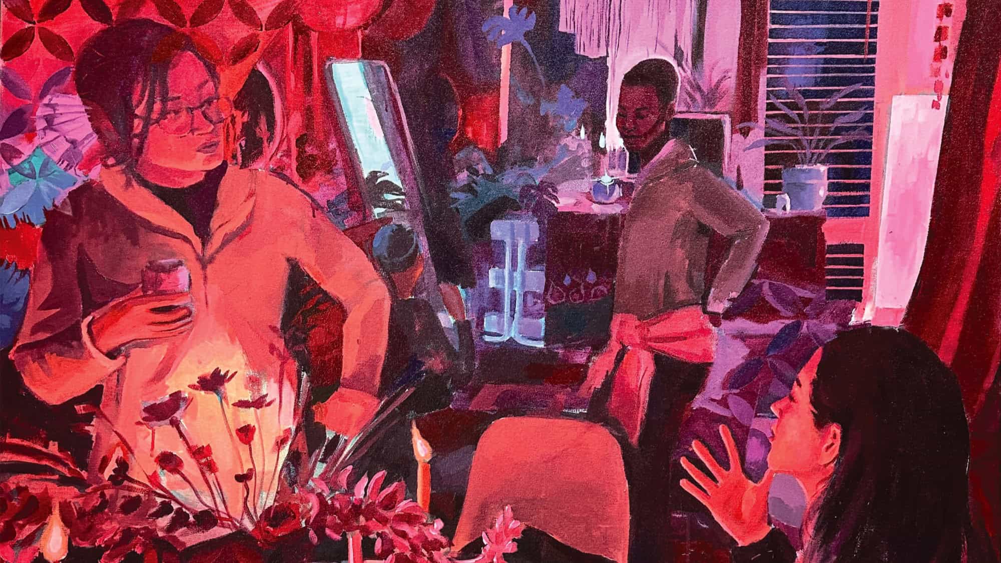 Three people are talking in a dimly lit, red-toned room filled with plants, flowers, and various decorations. One person holds a drink while another gestures with their hand.