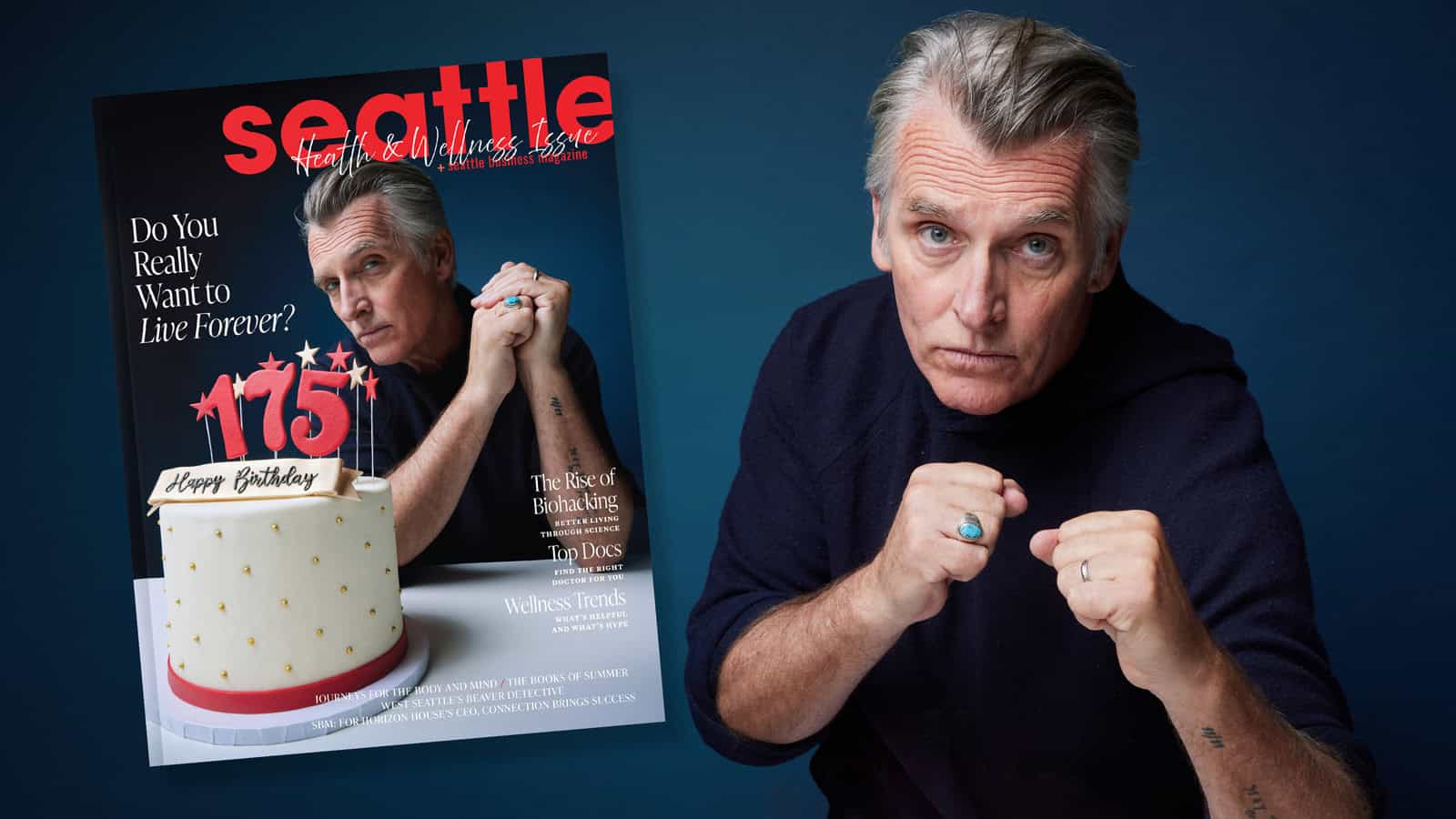 A man with gray hair poses with clenched fists next to a Seattle magazine cover featuring him and a cake with "175" candles, celebrating the magazine's anniversary.