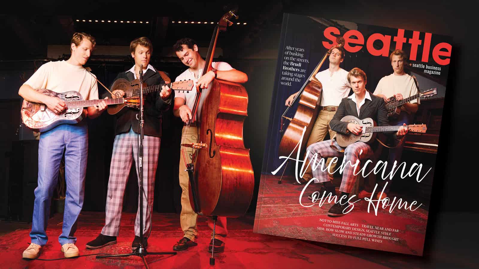 Four men in casual clothing play string instruments onstage; the same group appears on the cover of Seattle Business Magazine’s September/October Issue with the headline “Americana Comes Home,” capturing a seasonal shift in local music culture.