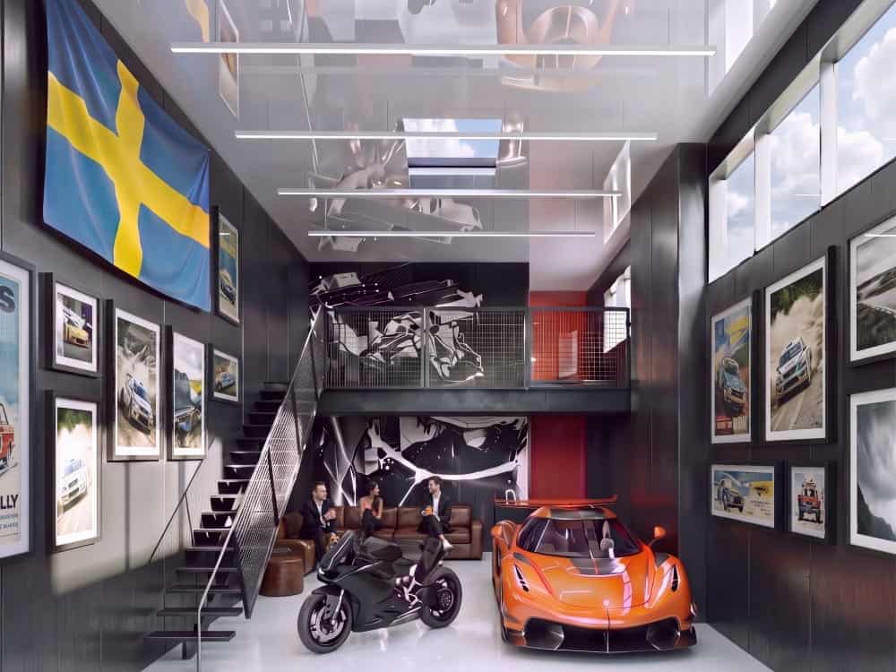 A modern garage with a sports car, a motorcycle, and three people on a leather sofa beneath framed racing prints, perfect for luxury car storage in Seattle.