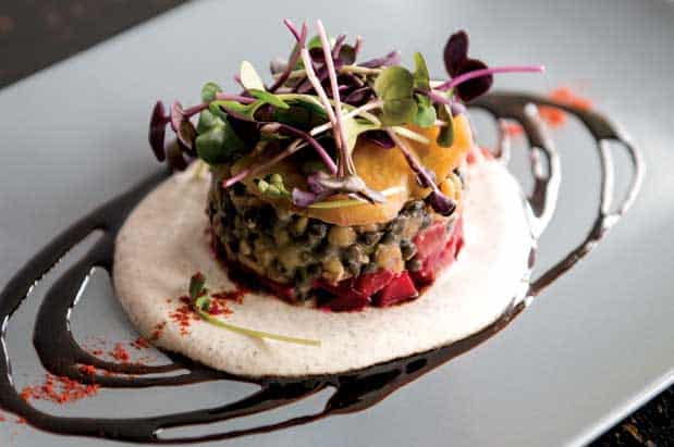 Recipe for Smoked Lentil Sunchoke Cake with Black Garlic Hemp Seed Sauce