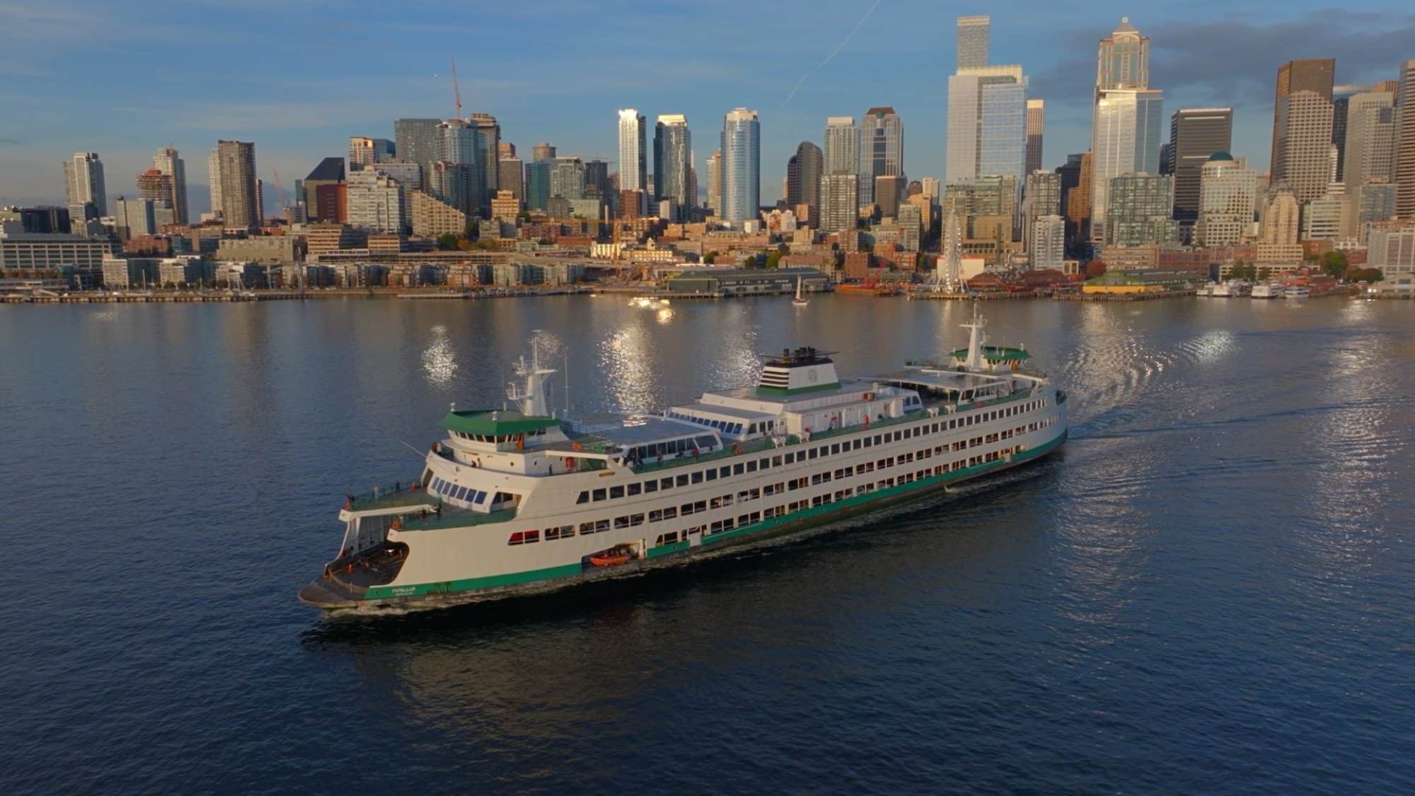 A still frame from Visit Seattle's destination video showing the Bainbridge ferry departing from Seattle.