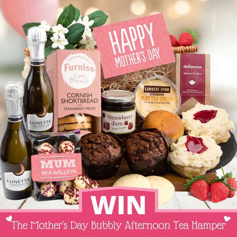 Enter our exclusive Mother's Day giveaway for a chance to win a delightful hamper, complete with sparkling wine, Cornish shortbread, strawberry jam, clotted cream, muffins, milk chocolate, and a charming pink "Happy Mother's Day" sign.