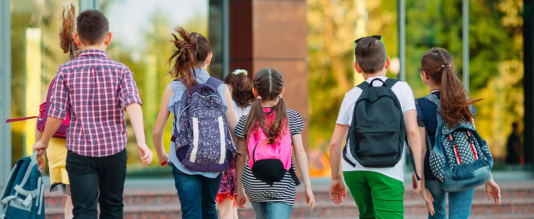 back to school kids with backpacks Back-to-School — Backpack Safety Tips for Kids