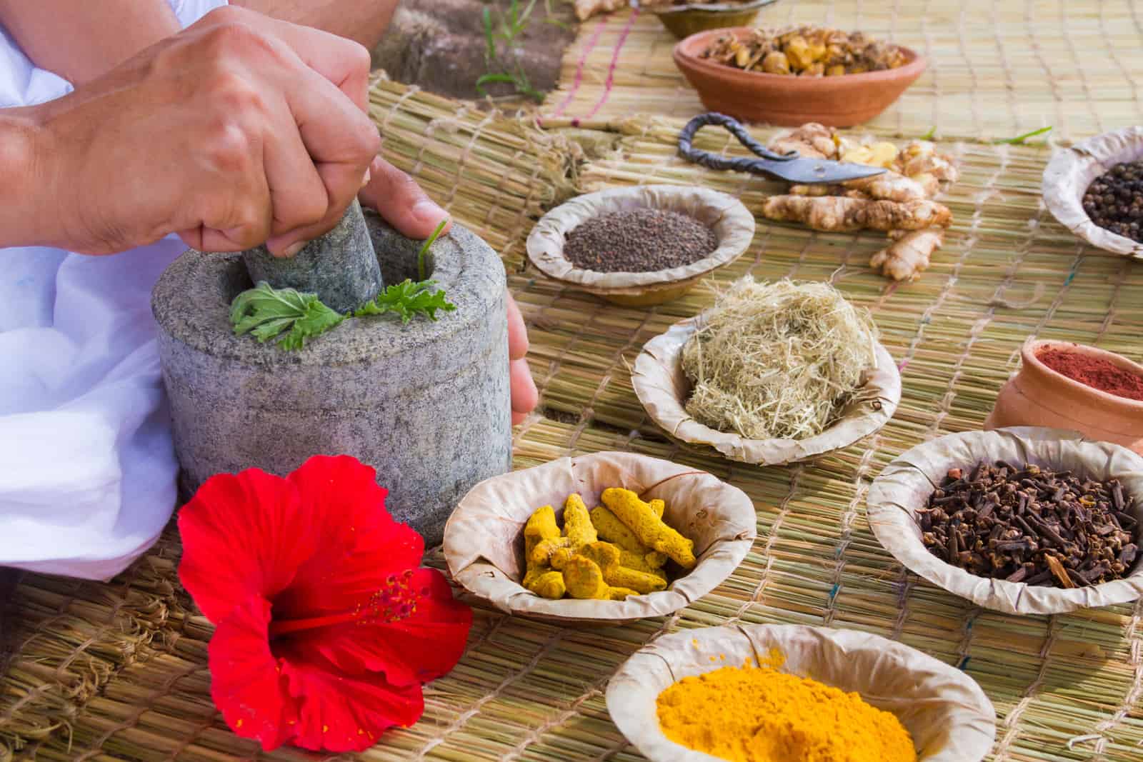 a-young-man-preparing-ayurvedic-medicine-in-the-traditional-manner-in-india