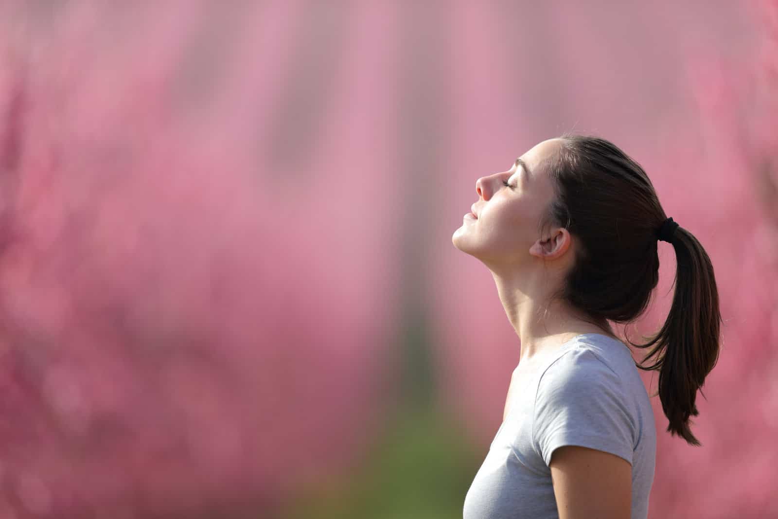 runner-breathing-fresh-air-in-a-pink-field