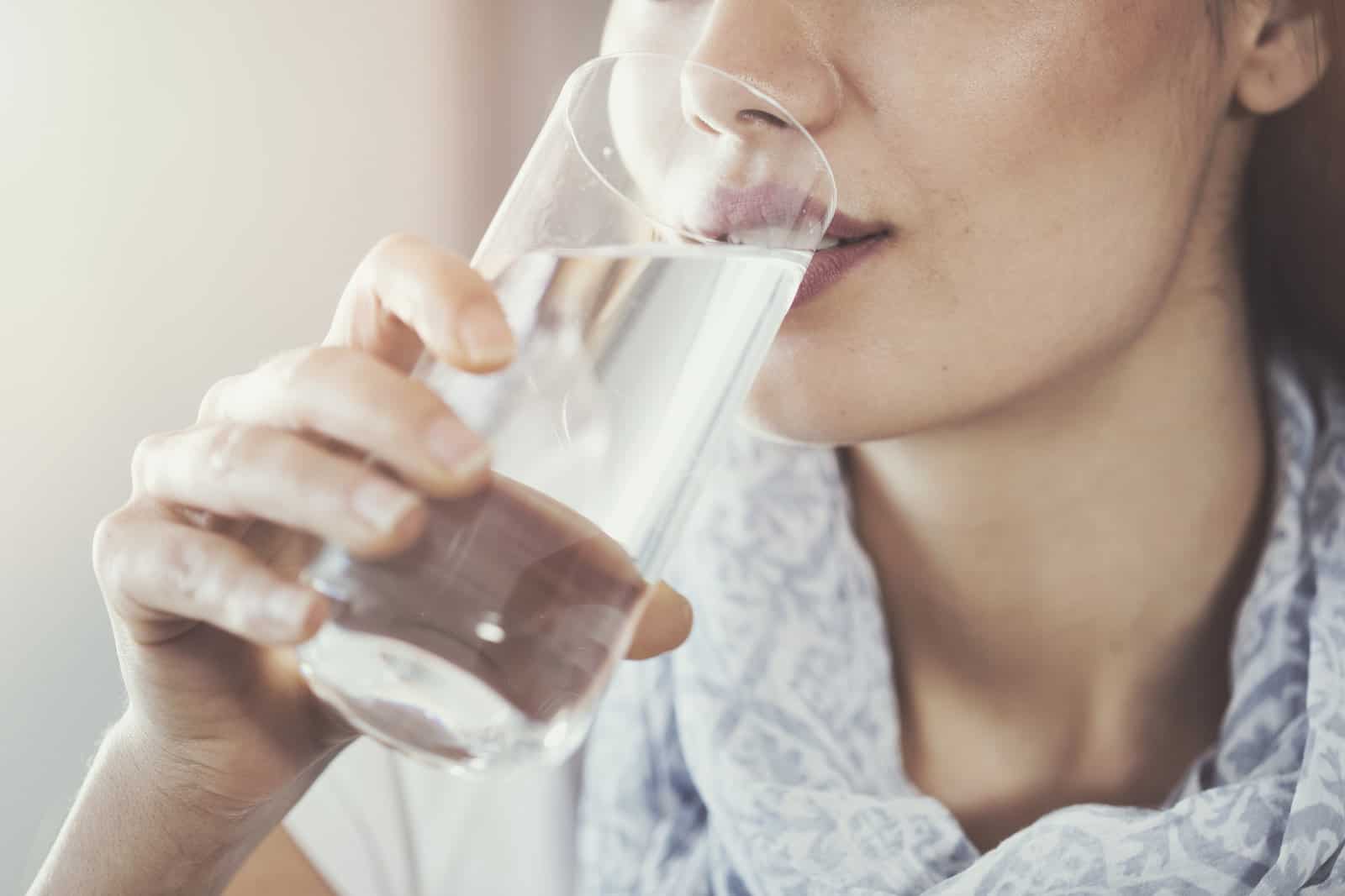 young-woman-drinking-pure-glass-of-water