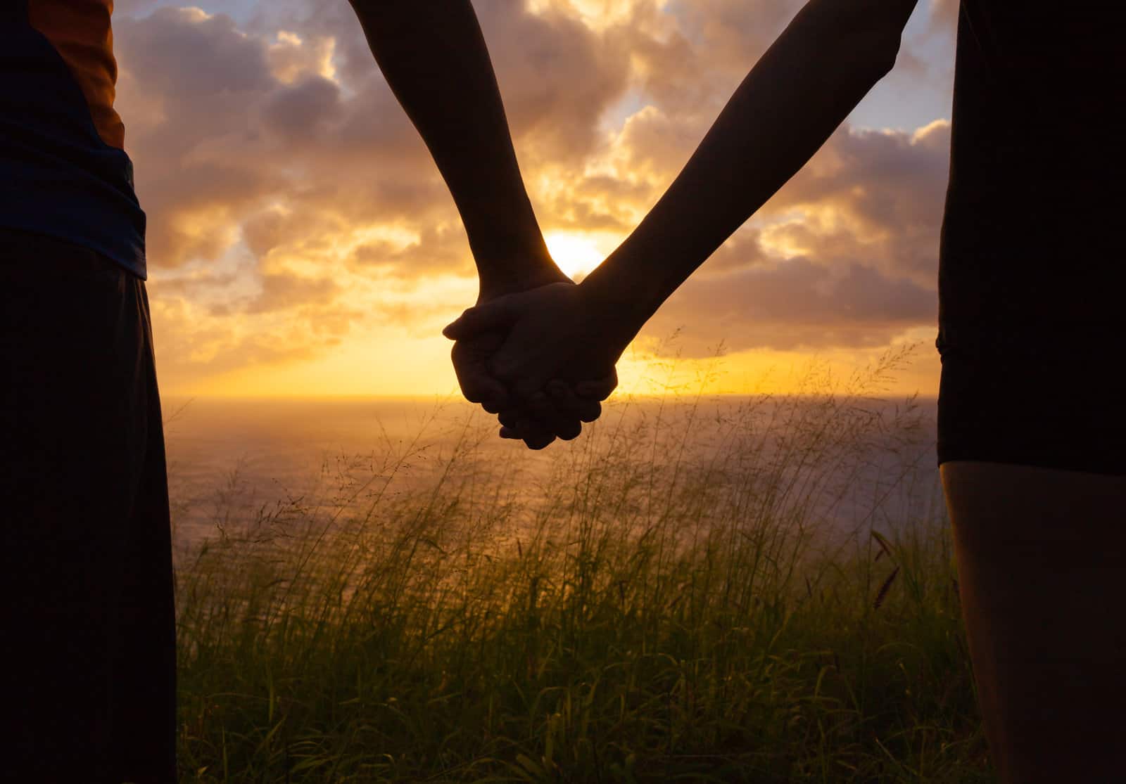 loving-couple-enjoying-beautiful-sunset-in-hawaii