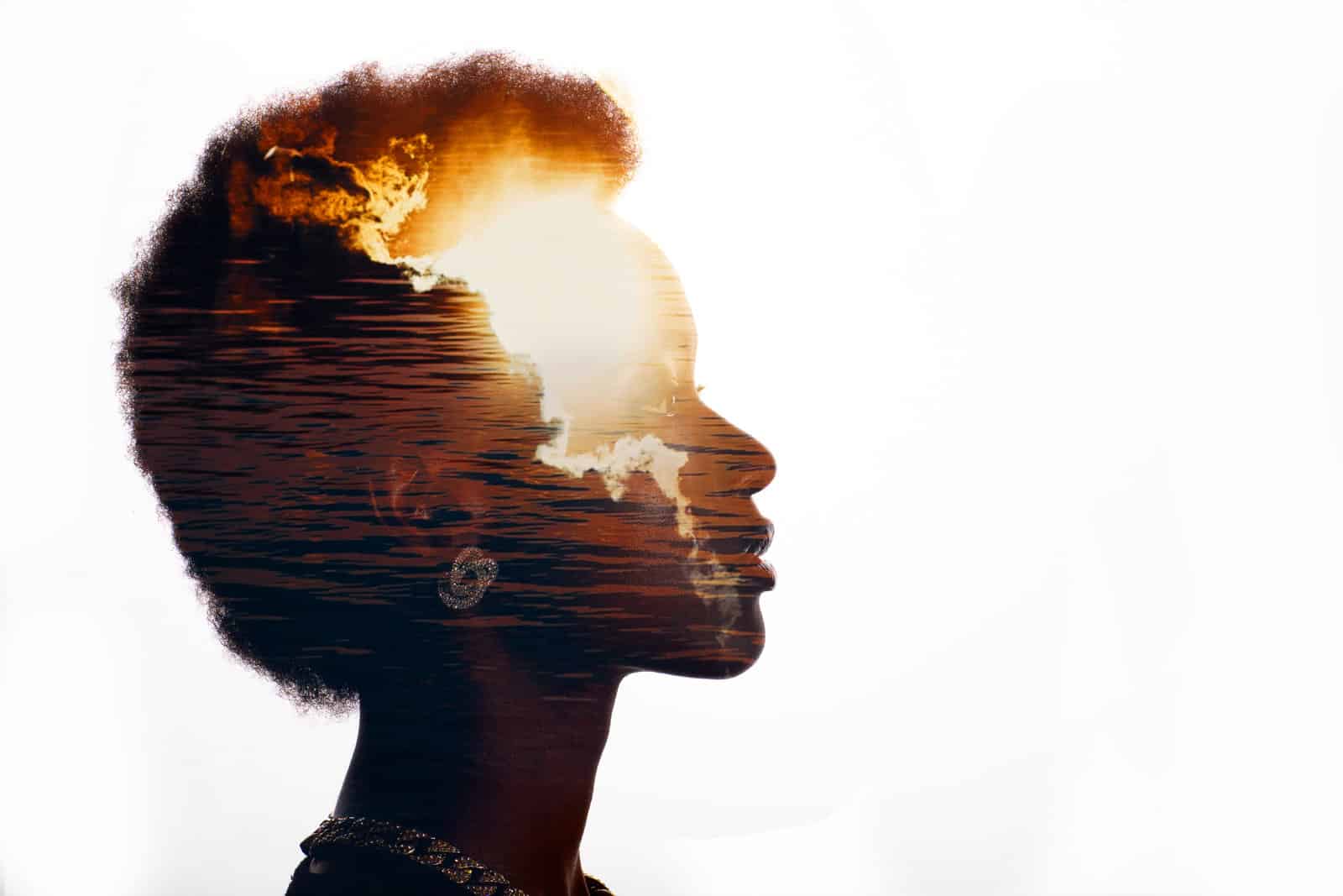 multiple-exposure-image-with-sunrise-and-sea-inside-african-american-woman-silhouette-black-lives-matter-and-freedom-mindset-concept