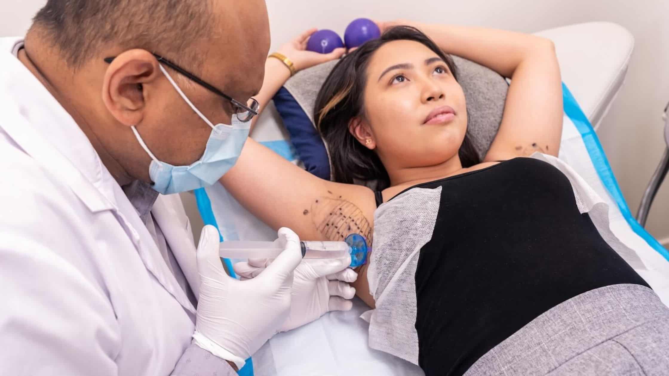 Young woman having the miraDry treatment performed on her at BC Laser and Skincare Clinic in Surrey, BC.
