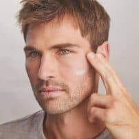 Colorescience® No-Show™ Mineral Sunscreen SPF 50 - male applying product