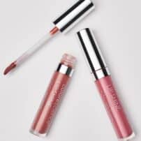Lip shine SPF by Colorescience - two bottles and an applicator showing