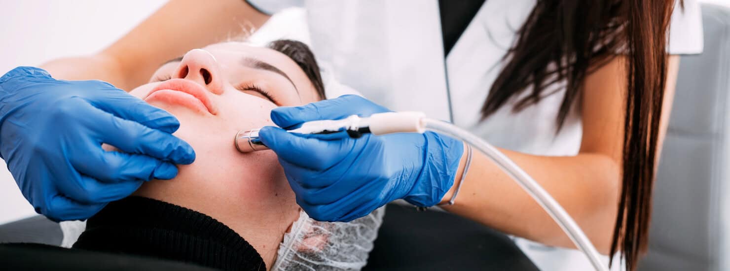 Microdermabrasion procedure facial cosmetic technician