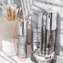 SkinMedica Retinol on bathroom sink with other SkinMedica products - shown for size comparison