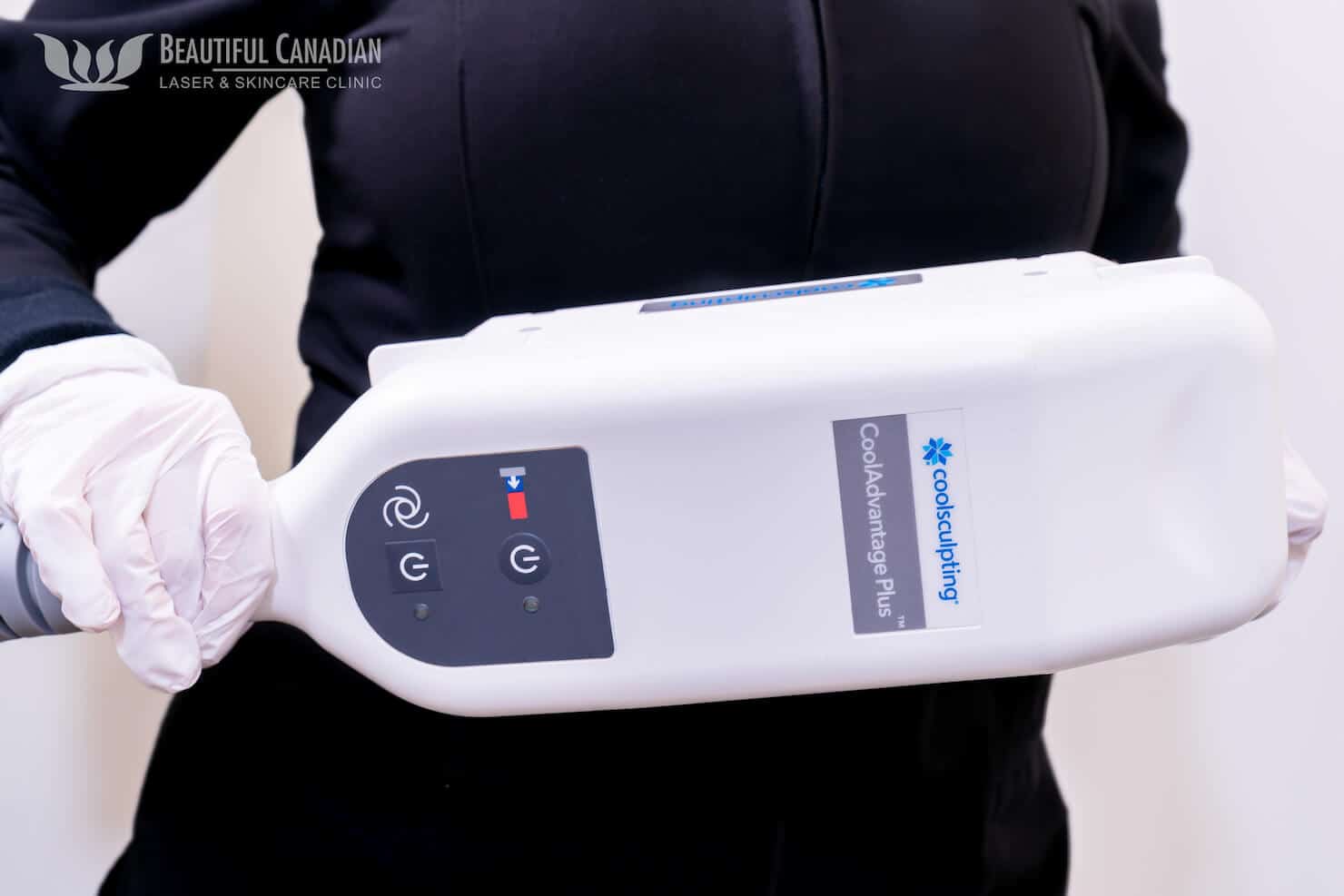 Vancouver CoolSculpting scholar holding CoolAdvantage Plus hand piece showing the front - for non-surgical fat removal on large areas